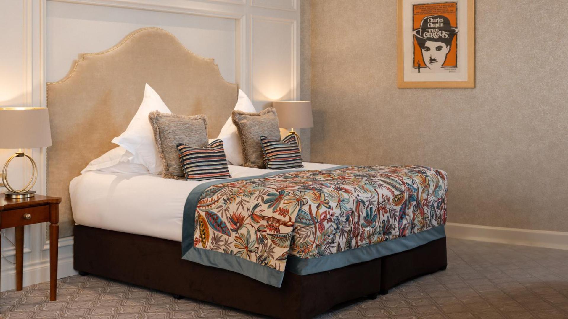 The Culloden Estate And Spa Holywood  Bagian luar foto A bed with a bed frame